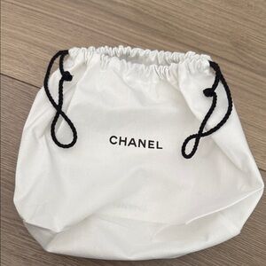 CHANEL White Bag with Black Drawstrings